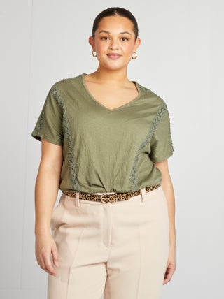 Blusa de tejido de crepé con bordados
